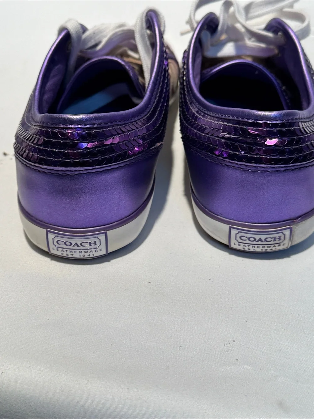Coach Women's Signature Canvas Sneakers with Purple Trim and White Soles